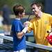 Jason Kerst and Sven Holcombe embrace after the Men's Singles Open in the Ann Arbor City Tennis Tournament on Sunday, July 14. Daniel Brenner I AnnArbor.com